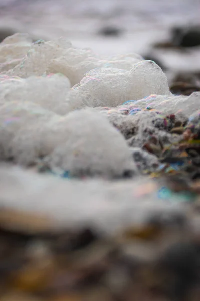 海滩上有选择性的泡沫聚焦点镜头 — 图库照片