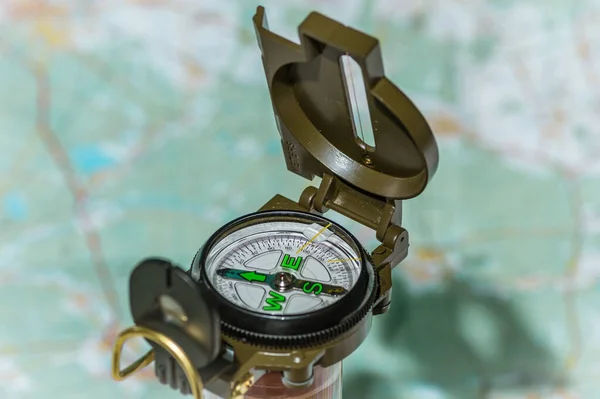 Closeup Shot Modern Navigation Metal Tourist Compass Blurred Background — Stock Photo, Image