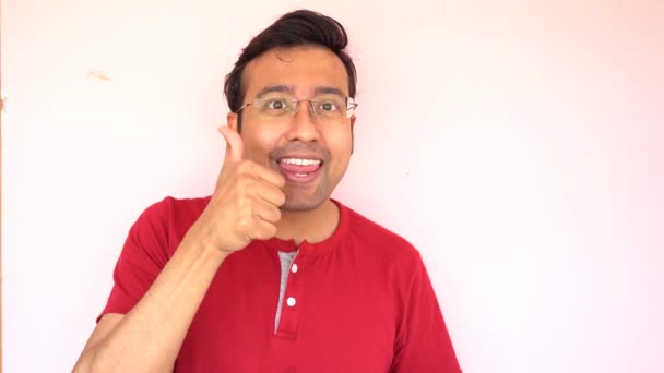 Indian Man Wearing Red Shirt Happily Showing Thumbs — Stockvideo