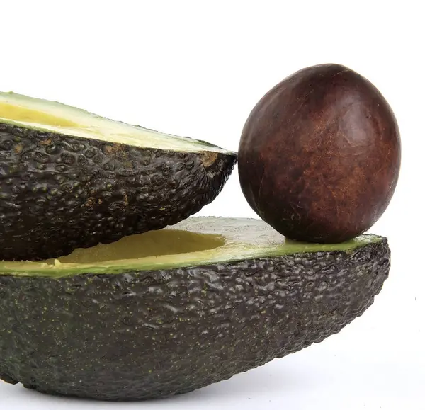 Nucleo Avocado Avocado Tagliato Isolato Uno Sfondo Bianco — Foto Stock