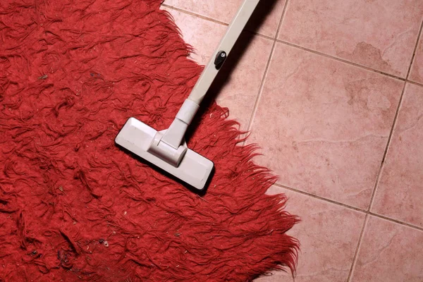 High Angle Shot Vacuum Cleaner Cleaning Dirty Carpet Royalty Free Stock Photos