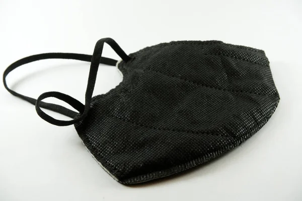 Closeup Foldblack Protective Mask Isolated White Background Covid19 Concept — Stock Photo, Image