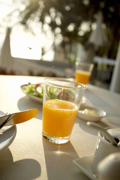 Vertical Shot Glass Orange Juice Breakfast Table Stock Photo