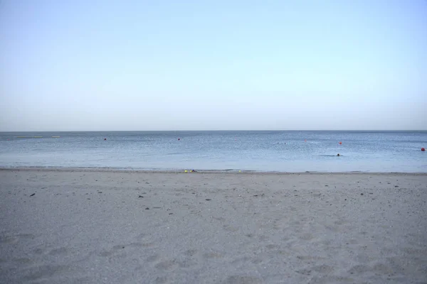 Primo Piano Una Spiaggia Ciottoli Durante Tramonto Perfetta Sfondo — Foto Stock