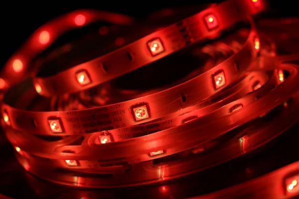 Primer Plano Una Tira Silicona Led Con Luces Rojas Sobre —  Fotos de Stock