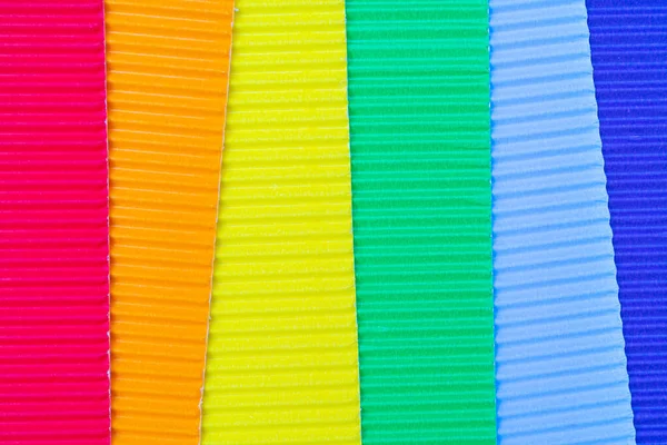 Крупный План Разноцветной Гофрированной Бумаги Огнями Текстур Фона — стоковое фото