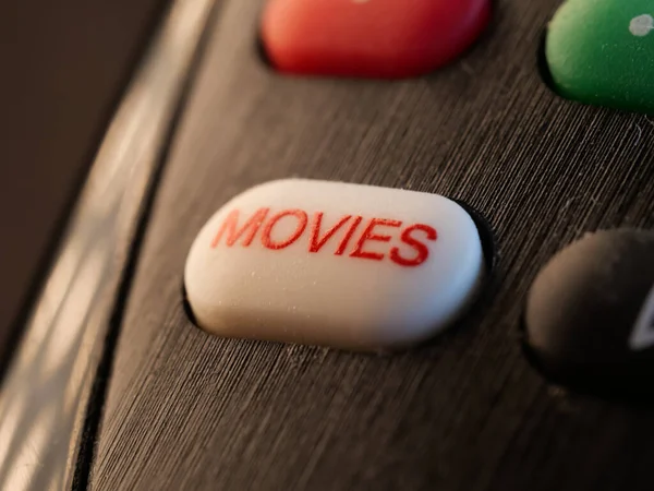 Selective Focus Shot Remote Control Button Movies Black Background — Stock Photo, Image