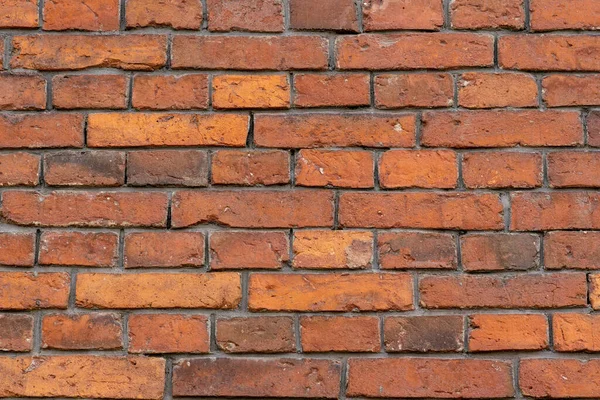 Een Closeup Van Een Rode Baksteen Muur Achtergrond — Stockfoto