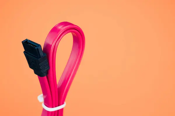 Een Close Shot Van Een Roze Kabel Een Kleurrijke Achtergrond — Stockfoto