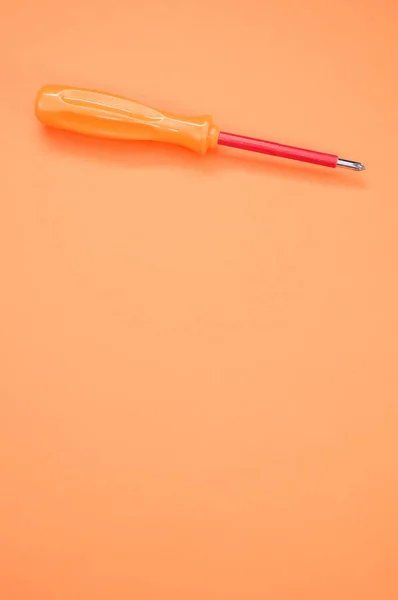 Vertical Shot Orange Screwdriver Colorful Background — Stock Photo, Image