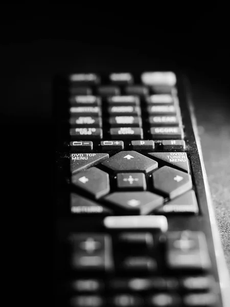 Selective Focus Shot Black Remote Control Rubber Buttons Dark Background — Stock Photo, Image