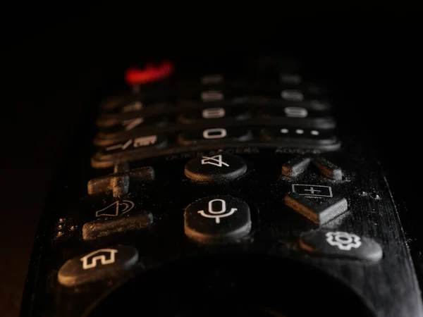 Selective Focus Shot Black Remote Control Rubber Buttons Dark Background — Stock Photo, Image
