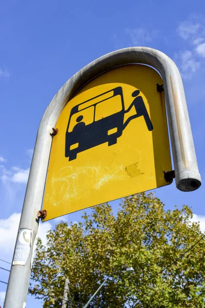 Low Angle Weathered Metallic Yellow Painted Bus Stop Sign Street — Stock Photo, Image