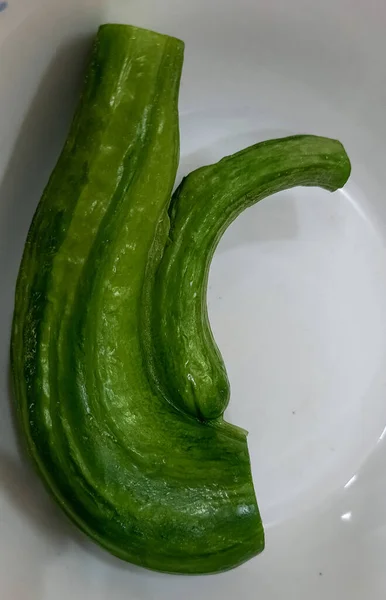 Closeup Crooked Cucumber Plate — Stock Photo, Image