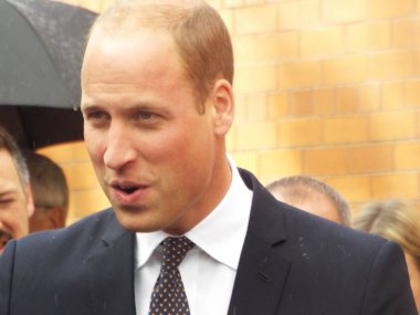 WALLASEY, UNITED KINGDOM - Jan 15, 2015: Seacombe Wallasey Wirral Merseyside united kingdom 01/15/2015 HRH Prince William on a walkabout in Seacombe at local swimming baths. clipart