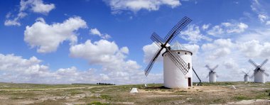 A panoramic shot of Windmills of Campo de Criptana, Spain clipart