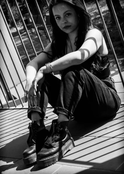 Vertical Grayscale Shot German Caucasian Woman Wearing Black Clothing Sitting — ストック写真