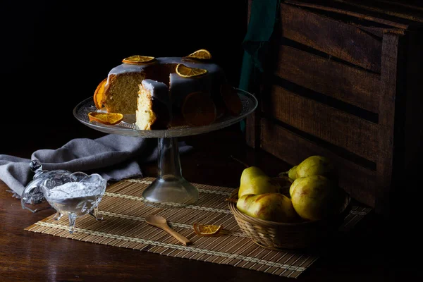 Closeup Shot Tasty Orange Cake Yogurt Pear Table — Stock Photo, Image