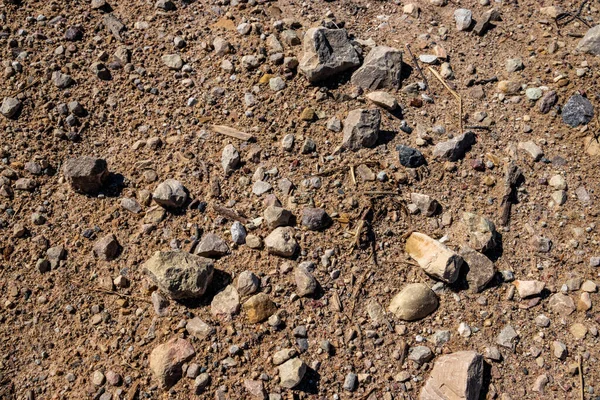 Eine Nahaufnahme Oberflächenstruktur Mit Kleinen Kieselsteinen Auf Schmutzigem Boden — Stockfoto