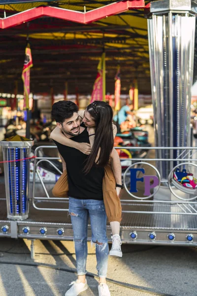 Joyful Romantic Couple Hugging Each Other Having Fun Amusement Park — 스톡 사진