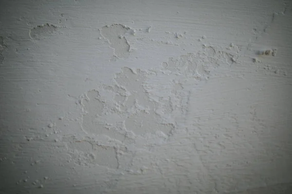 漆喰を塗られた白水の壁の平らな背景 — ストック写真