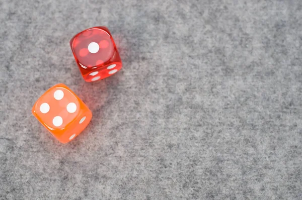 Pair Colorful Dice Copy Space Them Gray Woolen Background — Stockfoto