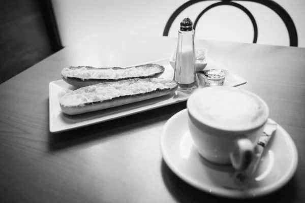 Grayscale Closeup Shot Cup Coffee Bread Slices — Stock Photo, Image