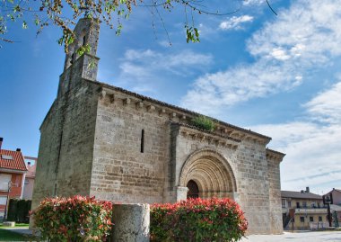 The ancient 12th century Parish Church San Juan Evangelista of Romanesque style in Valladolid clipart