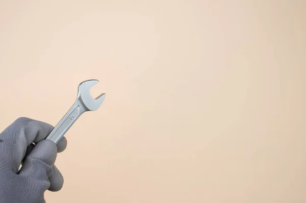 Een Close Shot Van Een Hand Dragen Handschoenen Houden Een — Stockfoto