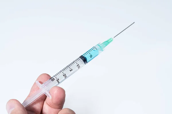 Man Hand Holding Syringe Isolated White Background — Stock Photo, Image