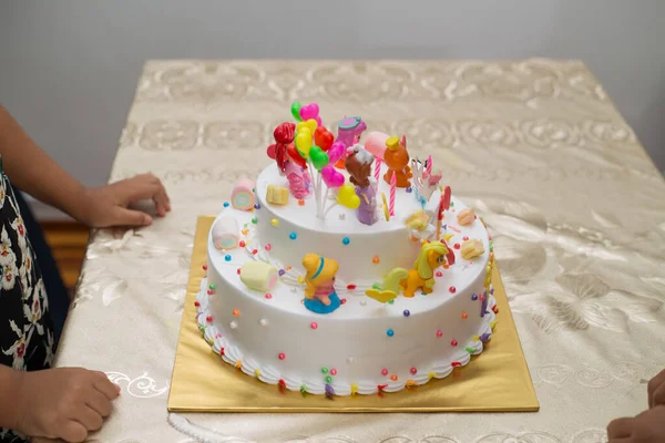 Closeup Shot Hands Table Colorful Birthday Cake Cartoon Character — Stock Photo, Image