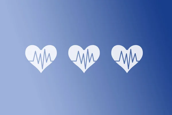 Three Heart Signs Ekg Isolated Blue Background — Stock Photo, Image