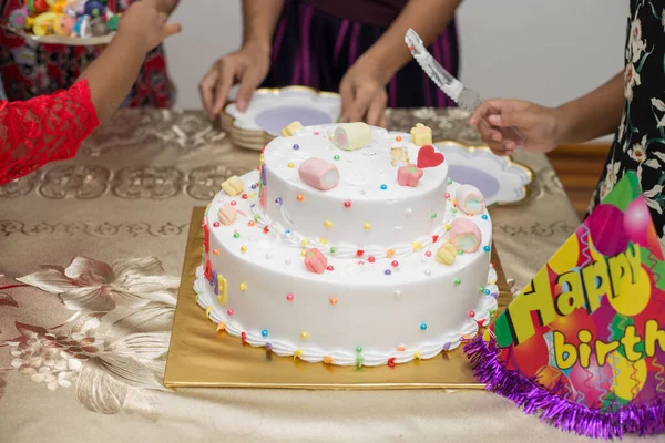 Closeup Shot Hands Cutting Colorful Birthday Cake Putting Plates — Stock Photo, Image