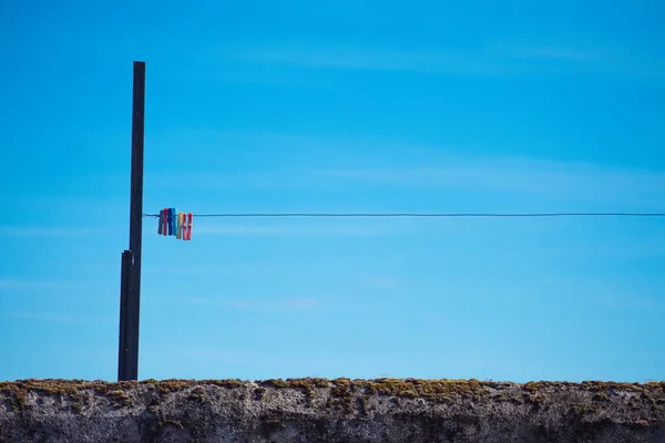 Bunch Colorful Laundry Pins Laundry Rope Attached Rod — Stock Photo, Image