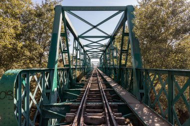 A long railway going over a bridge in Rivas-Vaciamadrid, Spain clipart