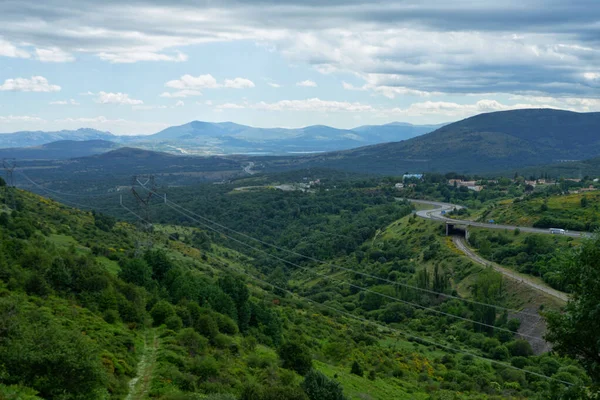 Scenic Green Valley Winding Road Background Hills Cloudy Sky — Stock Photo, Image