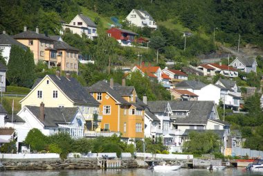 Colorful Scandinavian waterfronthouses of Norheimsund, Norway clipart