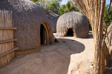 The African traditional buildings of cultural villages clipart