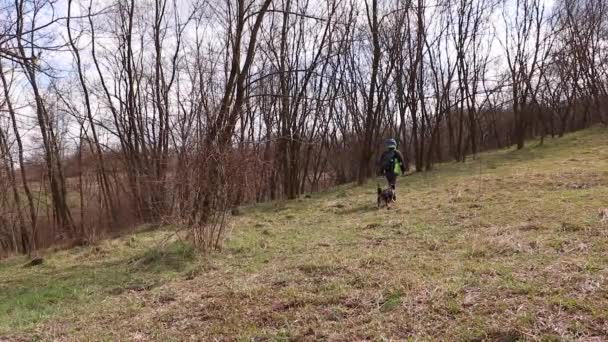 Beautiful Shot Male His Pet Dog Walking Mountain Field Withered — стоковое видео