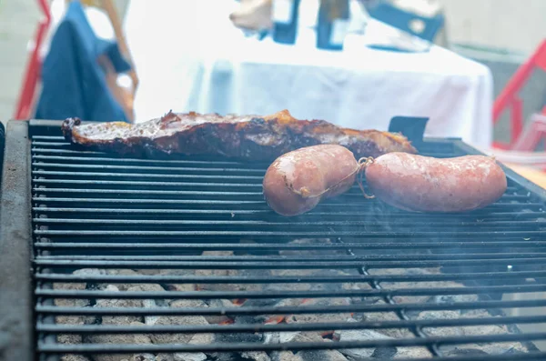 Closeup Shot Traditional Argentinian Asado Sausages Meat Cooking Grill Street — Zdjęcie stockowe