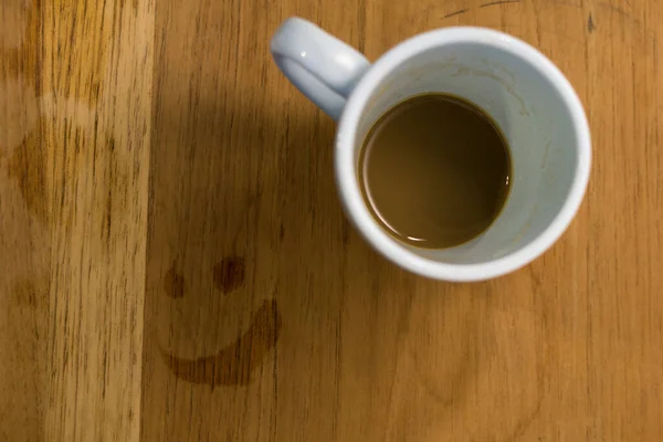 Top View Finished Cup Coffee Spots Form Smiley Face Table — Stockfoto