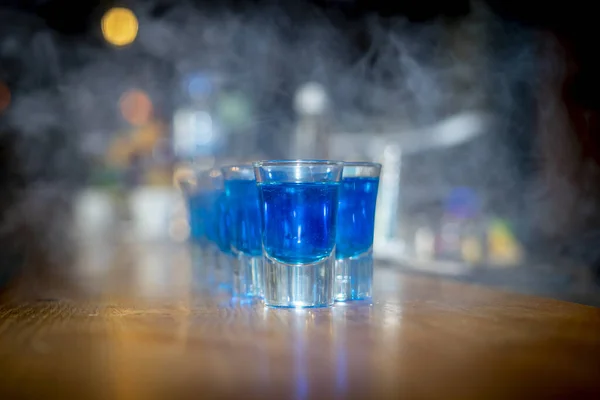 Selective Focus Shot Blue Drink Shot Glasses Dry Ice Smoke — Stock Photo, Image