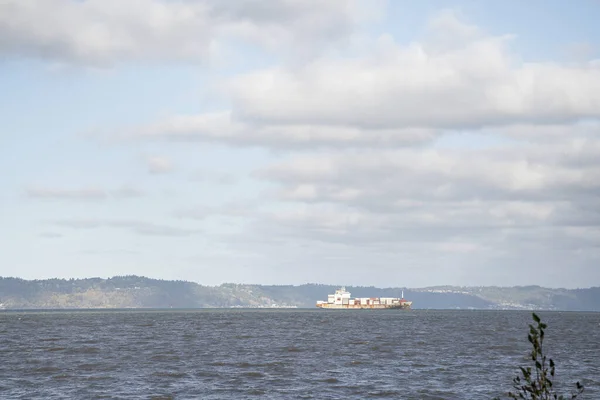 Container Ship Floating Sea Waters Cloudy Blue Sky — Φωτογραφία Αρχείου