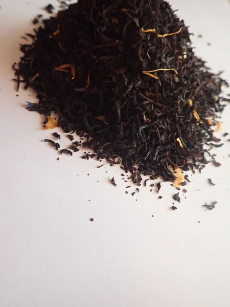 Vertical Shot Dry Black Tea White Surface — Stock Photo, Image