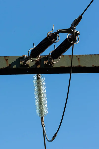 Vertical Shot Long Rod Insulators Background Clear Blue Sky — Φωτογραφία Αρχείου