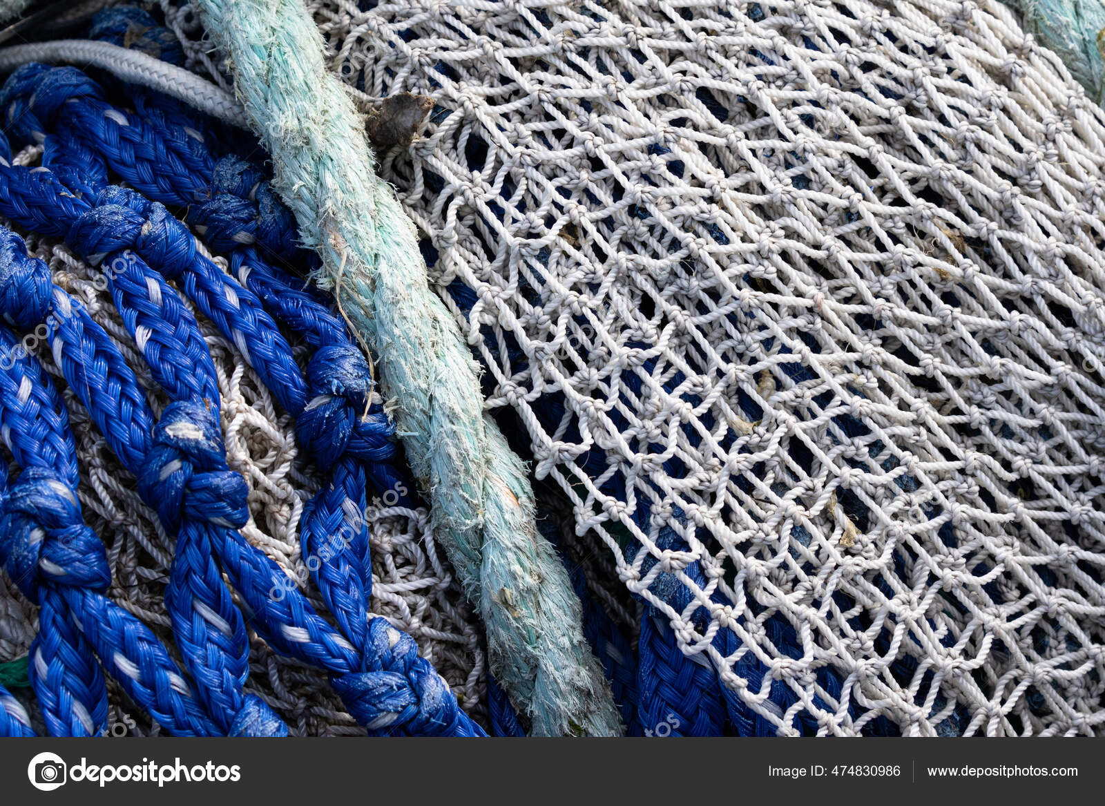 Two Fishing Nets Green Rope — Stock Photo © Wirestock #474830986
