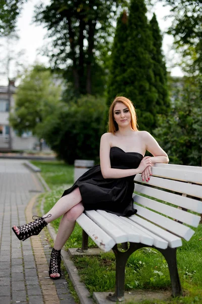 Vertical Shot Beautiful Bosnian Caucasian Woman Black Dress Sitting Bench — 스톡 사진