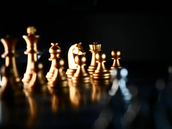 Horizontal shot of cool silver chess pieces in the starting position  reflected on the board Stock Photo by wirestock