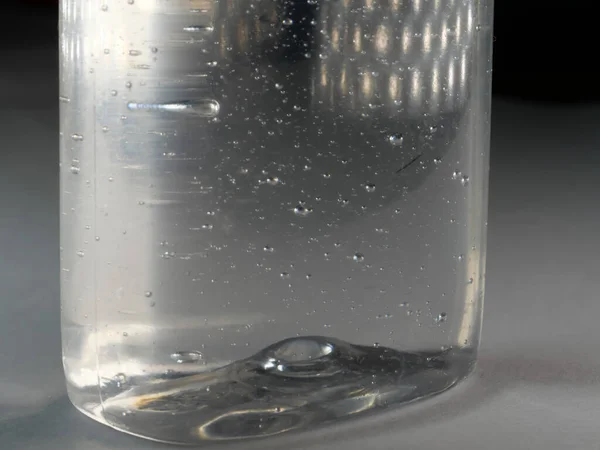 Closeup Shot Bottle Sanitizer White Surface — Stock Photo, Image