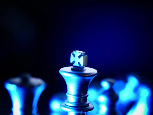 Closeup Shot King Chess Pieces Illuminated Blue Light Dark Background Stock Photo